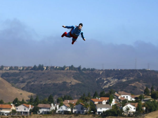 Radio controlled superman soaring over san diego