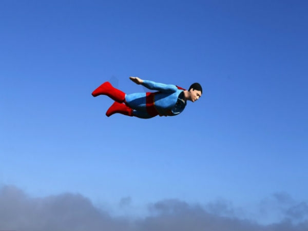Radio controlled superman soaring over san diego